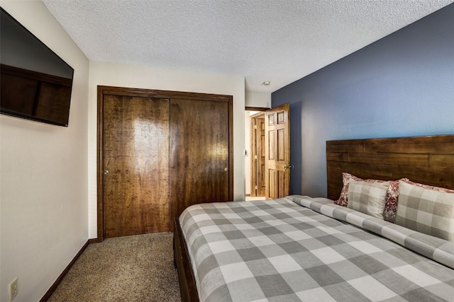 840 Four Oclock Rd Unit A1D, Breckenridge, CO 80424 - carpeted bedroom with a closet and a textured ceiling