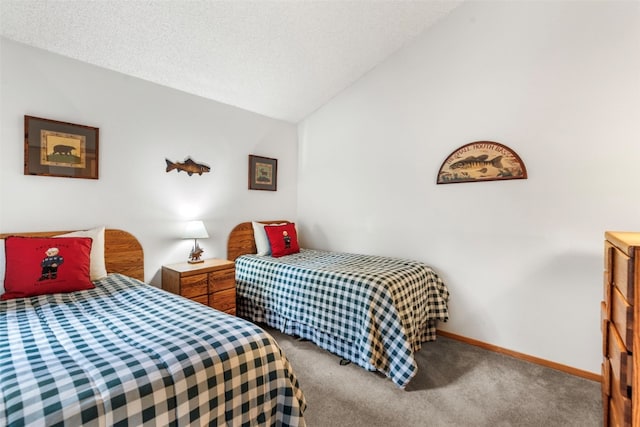 203 Creekside Dr Unit 201, Frisco, CO 80443 - carpeted bedroom featuring lofted ceiling and baseboards
