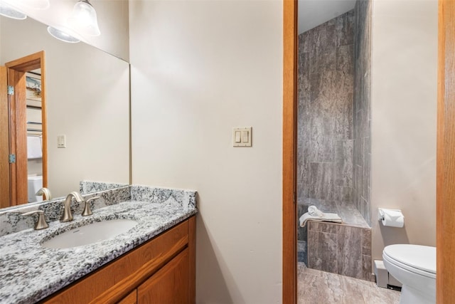 203 Creekside Dr Unit 201, Frisco, CO 80443 - bathroom featuring a tile shower and vanity