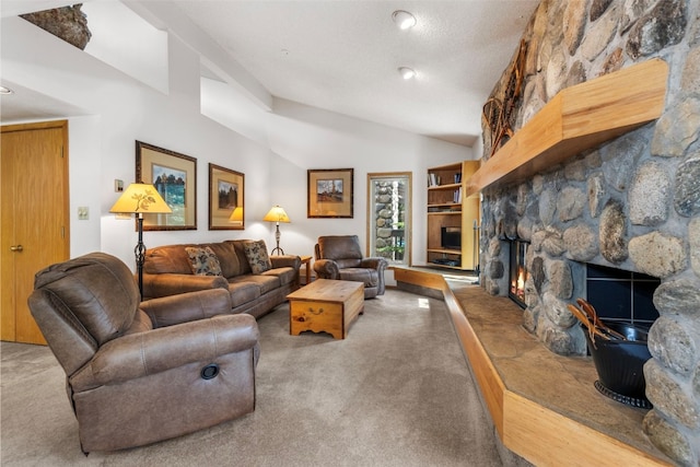203 Creekside Dr Unit 201, Frisco, CO 80443 - carpeted living room featuring lofted ceiling, a fireplace, and a textured ceiling