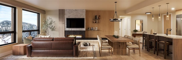75 Hunki Dori Ct Unit W403, Keystone, CO 80435 - living room featuring wood finished floors and a large fireplace