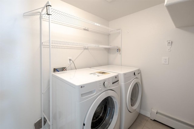 1921 Walton Creek Rd Unit 4, Steamboat Springs, CO 80487 - laundry room featuring a baseboard radiator, separate washer and dryer, and light tile patterned floors