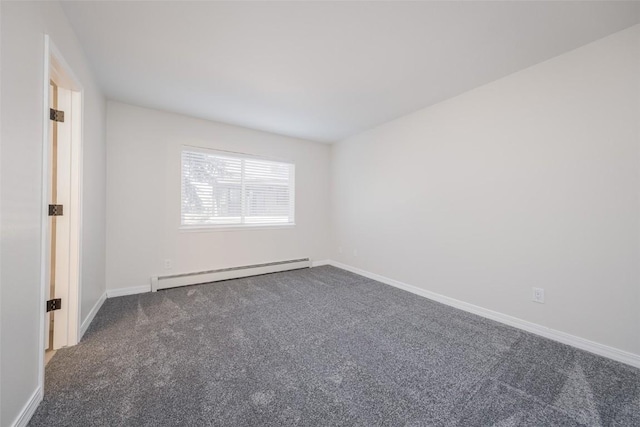 1921 Walton Creek Rd Unit 4, Steamboat Springs, CO 80487 - unfurnished room with baseboard heating and carpet