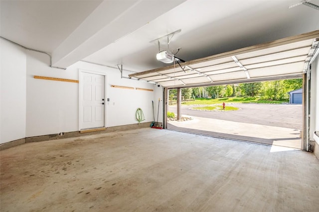 1921 Walton Creek Rd Unit 4, Steamboat Springs, CO 80487 - garage featuring a garage door opener