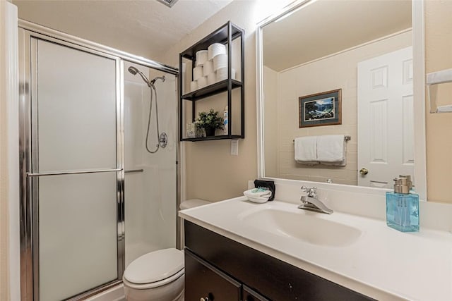 1920 Ski Time Square Dr Unit 315, Steamboat Springs, CO 80487 - bathroom with a shower stall, toilet, and vanity