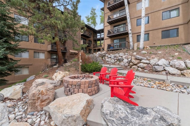 view of patio featuring a fire pit