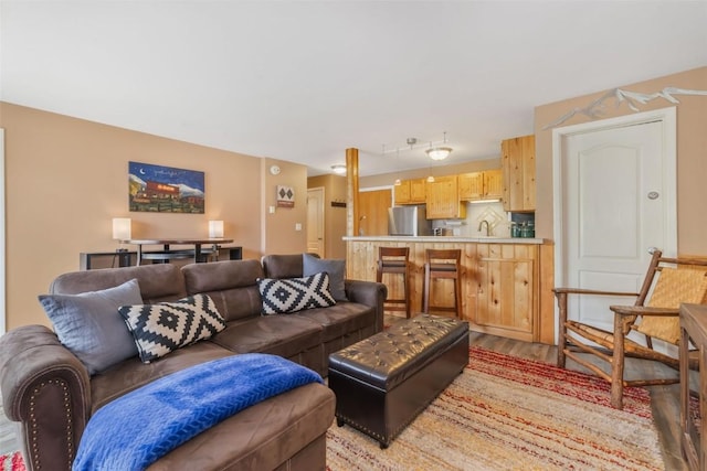 living room featuring light wood-style floors