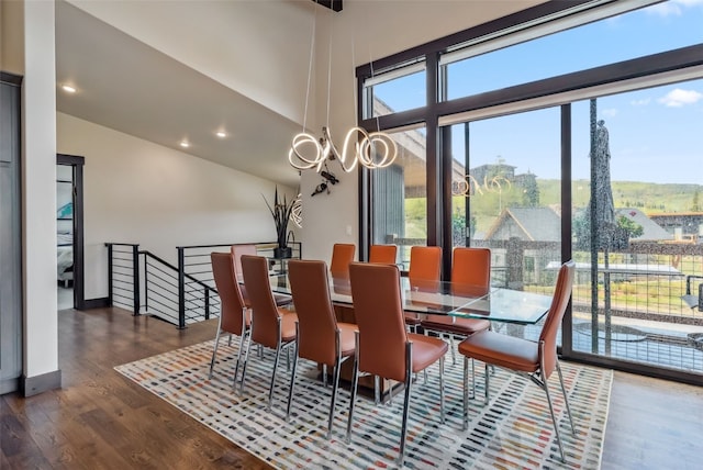 14 E Baron Way, Silverthorne, CO 80498 - dining space with wood finished floors, a chandelier, and recessed lighting