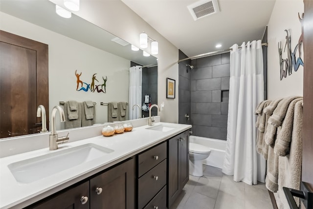 14 E Baron Way, Silverthorne, CO 80498 - full bathroom with toilet, double vanity, shower / bath combo, and tile patterned floors