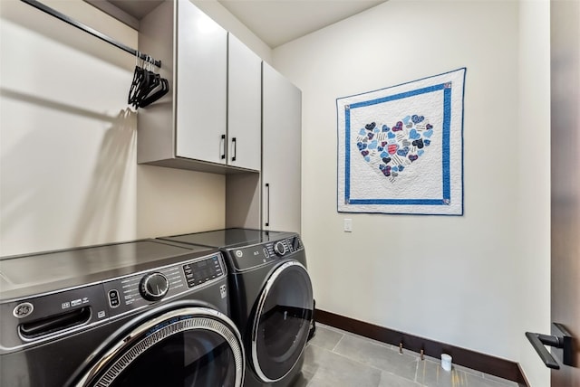 14 E Baron Way, Silverthorne, CO 80498 - laundry room with cabinet space, washing machine and clothes dryer, baseboards, and tile patterned floors
