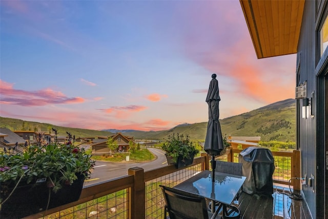 14 E Baron Way, Silverthorne, CO 80498 - deck at dusk featuring a mountain view and grilling area