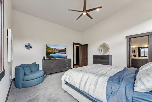 14 E Baron Way, Silverthorne, CO 80498 - carpeted bedroom with high vaulted ceiling, ensuite bath, and a ceiling fan