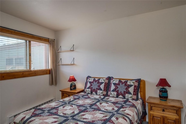 bedroom with a baseboard radiator