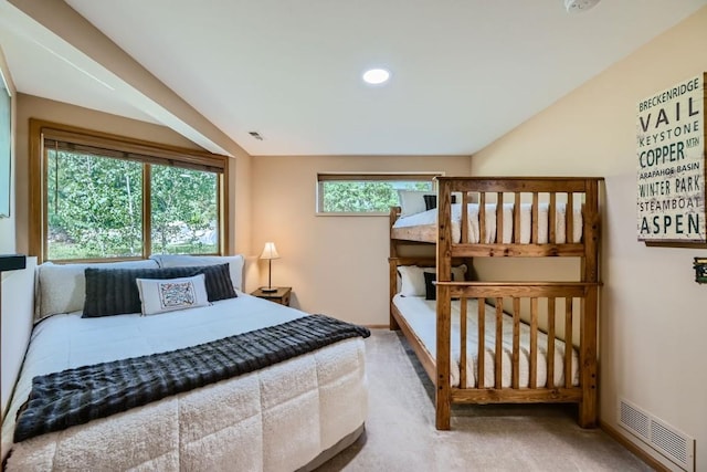 carpeted bedroom with recessed lighting and visible vents