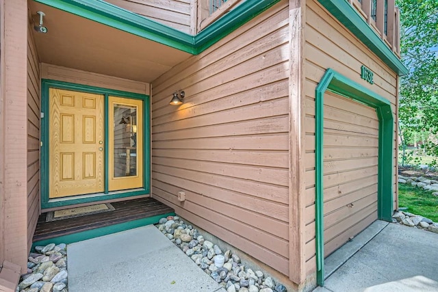 entrance to property featuring a garage