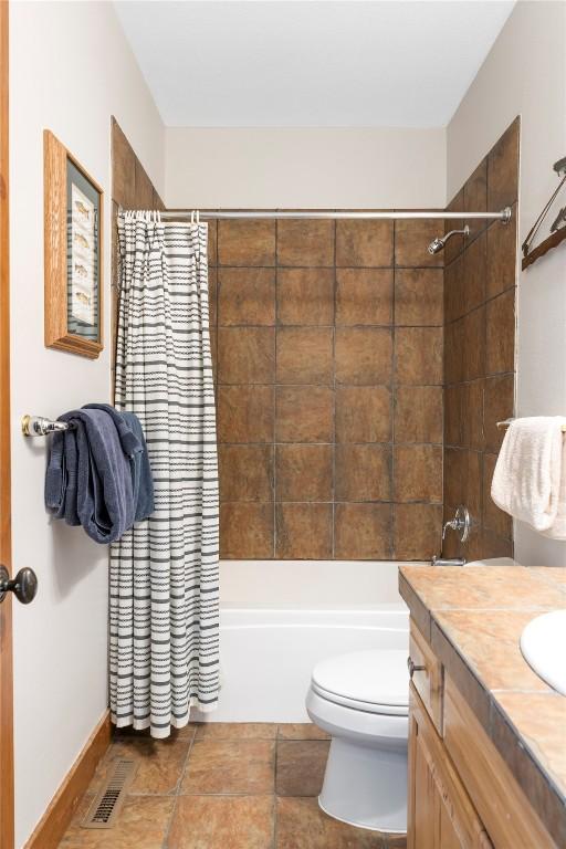 186 Rachel Ln, Breckenridge, CO 80424 - full bathroom with shower / tub combo, visible vents, vanity, and toilet