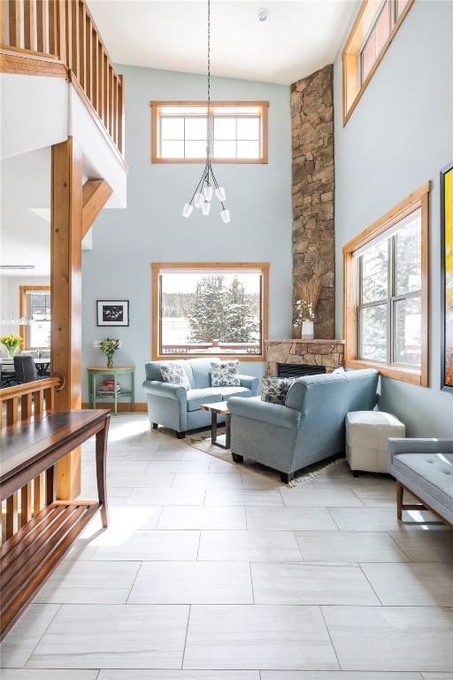 186 Rachel Ln, Breckenridge, CO 80424 - living room featuring a high ceiling and an inviting chandelier