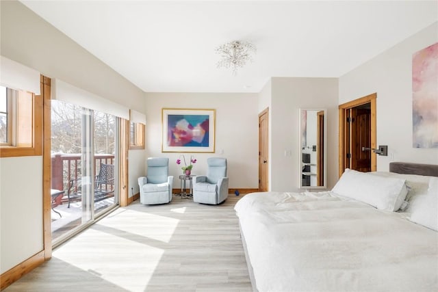 186 Rachel Ln, Breckenridge, CO 80424 - bedroom with access to exterior, light wood finished floors, and baseboards