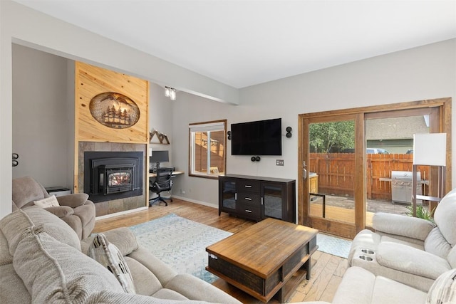 329 N Chipmunk Cir, Silverthorne, CO 80498 - living area with light wood-type flooring and a fireplace