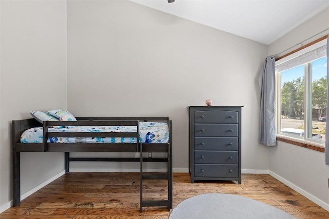 329 N Chipmunk Cir, Silverthorne, CO 80498 - bedroom with hardwood / wood-style floors and lofted ceiling