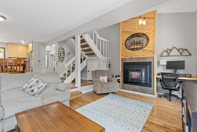 329 N Chipmunk Cir, Silverthorne, CO 80498 - living room with stairs, light wood-type flooring, a desk, and recessed lighting