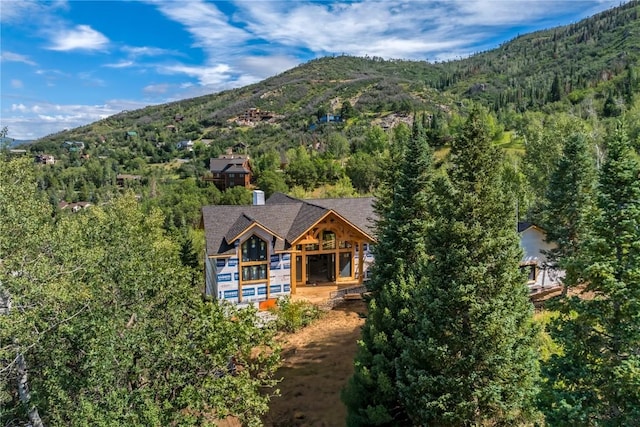 drone / aerial view featuring a mountain view