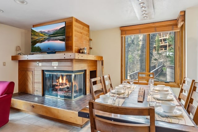 175 Argentine Ct Unit 1513, Keystone, CO 80435 - dining space featuring a tile fireplace and tile patterned flooring