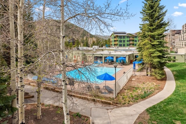 175 Argentine Ct Unit 1513, Keystone, CO 80435 - community pool featuring a patio area, a mountain view, and fence