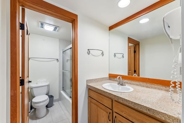 175 Argentine Ct Unit 1513, Keystone, CO 80435 - bathroom with toilet, vanity, combined bath / shower with glass door, tile patterned floors, and recessed lighting