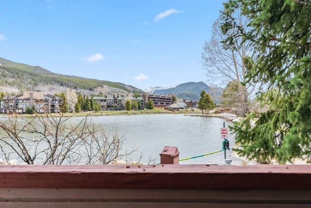 175 Argentine Ct Unit 1513, Keystone, CO 80435 - wooden deck featuring a wooded view