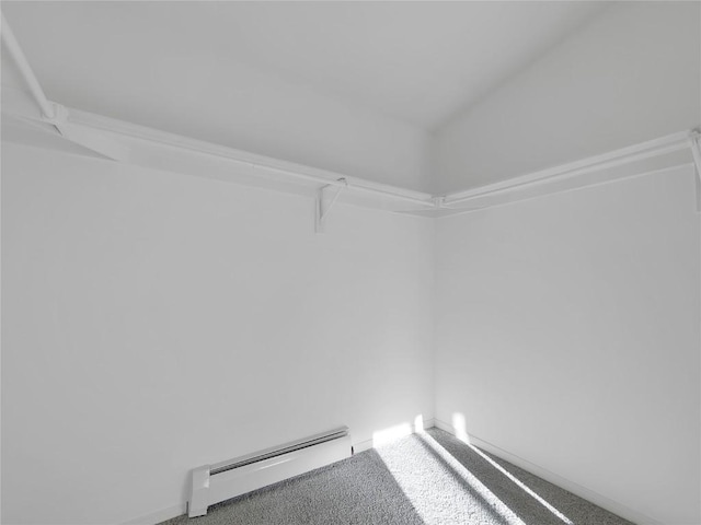 662 Alpine Rd, Dillon, CO 80435 - walk in closet featuring a baseboard heating unit and carpet flooring