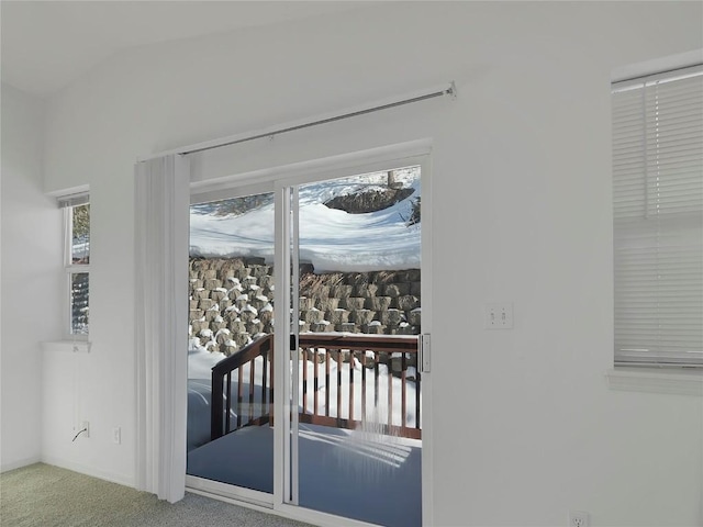 662 Alpine Rd, Dillon, CO 80435 - doorway featuring carpet floors and vaulted ceiling