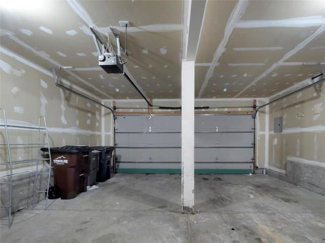 662 Alpine Rd, Dillon, CO 80435 - garage featuring a garage door opener and electric panel