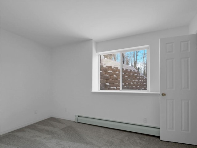 662 Alpine Rd, Dillon, CO 80435 - empty room featuring a baseboard radiator, carpet flooring, and baseboards
