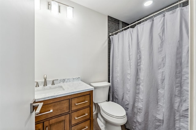 0630 Temple Trl, Frisco, CO 80443 - full bath featuring toilet, vanity, and a shower with shower curtain