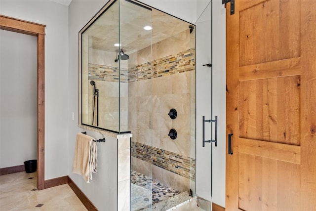 2357 Poma Ln Lot 2, Steamboat Springs, CO 80487 - bathroom with a stall shower, baseboards, and tile patterned flooring