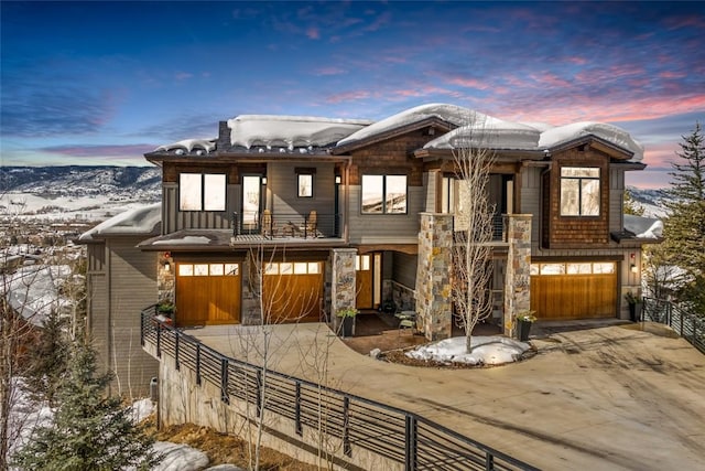 2357 Poma Ln Lot 2, Steamboat Springs, CO 80487 - view of front of house with a balcony, driveway, a garage, and stone siding