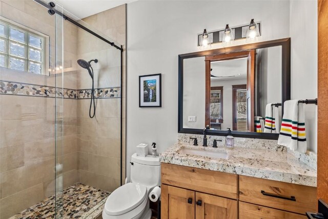 2357 Poma Ln Lot 2, Steamboat Springs, CO 80487 - bathroom featuring vanity, a stall shower, and toilet