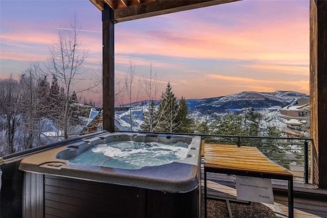 2357 Poma Ln Lot 2, Steamboat Springs, CO 80487 - snow covered deck featuring a hot tub and a mountain view