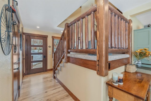 29780 Riffle Run, Oak Creek, CO 80467 - entryway with stairway, light wood-type flooring, baseboards, and recessed lighting