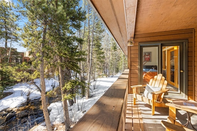 view of snow covered deck