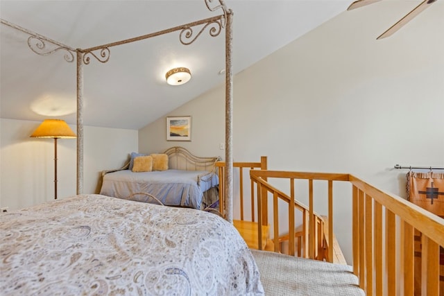 bedroom featuring lofted ceiling