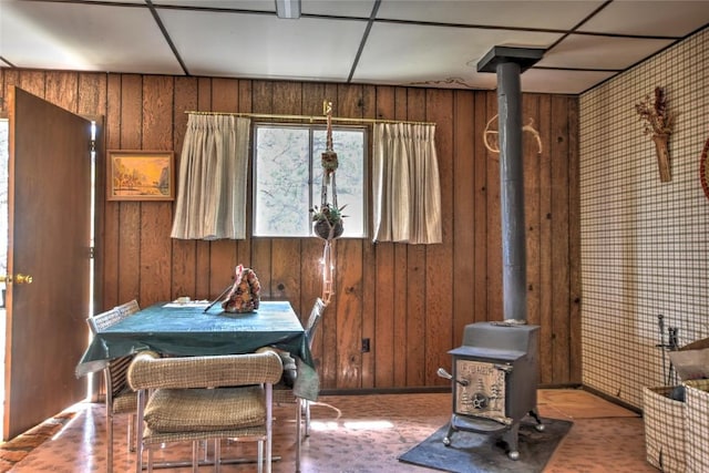 490 Teller St, Lake George, CO 80827 - dining room featuring a wood stove and wooden walls