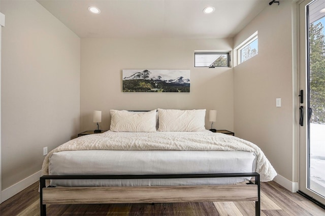 436 N Fuller Placer Rd Unit 38B, Breckenridge, CO 80424 - bedroom with baseboards, recessed lighting, wood finished floors, and access to exterior