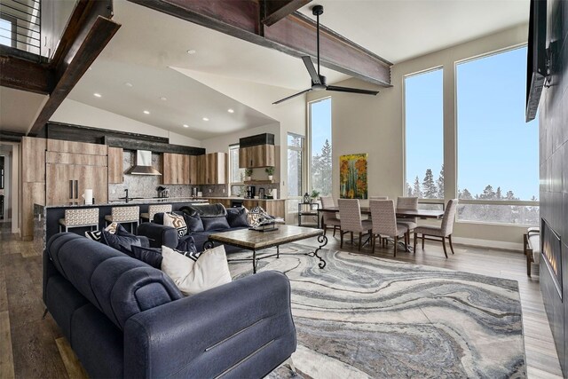436 N Fuller Placer Rd Unit 38B, Breckenridge, CO 80424 - living area featuring recessed lighting, a ceiling fan, vaulted ceiling with beams, and wood finished floors
