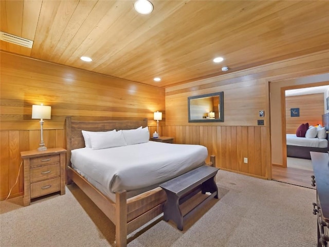 203 Gentian Rd, Keystone, CO 80435 - bedroom with wooden ceiling, wooden walls, light carpet, and recessed lighting
