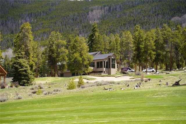 203 Gentian Rd, Keystone, CO 80435 - view of community with a forest view, a lawn, and a mountain view