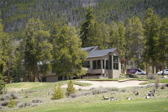 203 Gentian Rd, Keystone, CO 80435 - view of property exterior featuring a view of trees