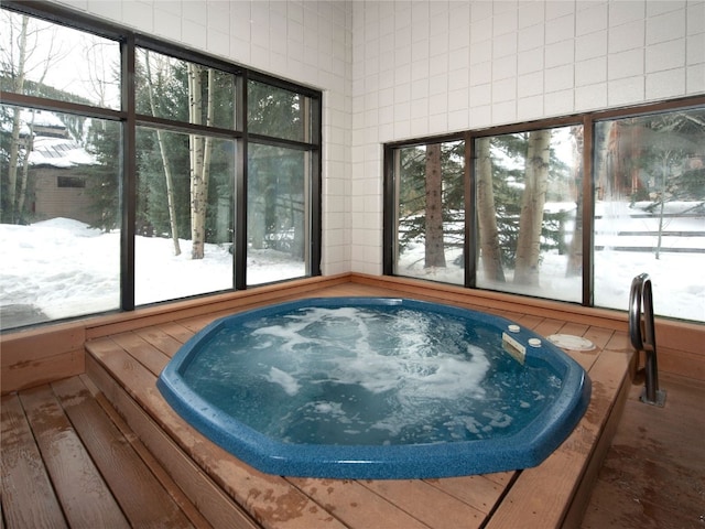 interior space with an indoor hot tub