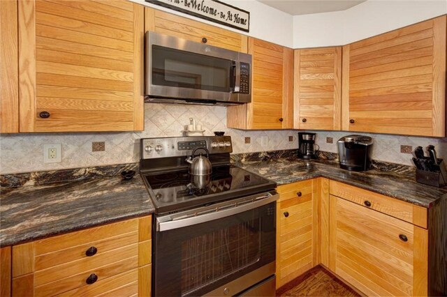 22804 US Highway 6 Unit 102, Keystone, CO 80435 - kitchen featuring appliances with stainless steel finishes and tasteful backsplash